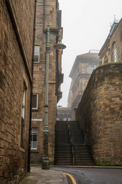 Guthrie Street in Old Town, steps lead to the Chamber Street, in a gloomy misty day