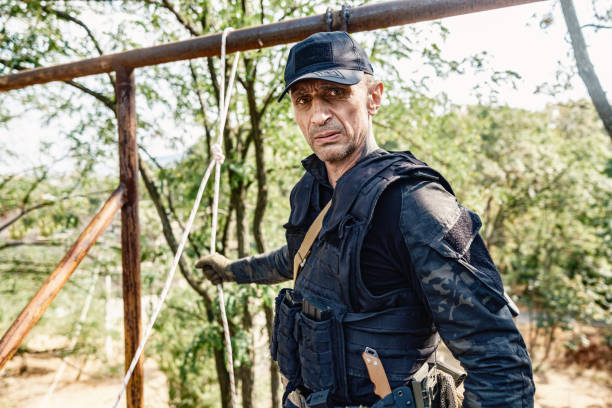 istock Special forces operative getting ready for descending rope in military training 2170585342