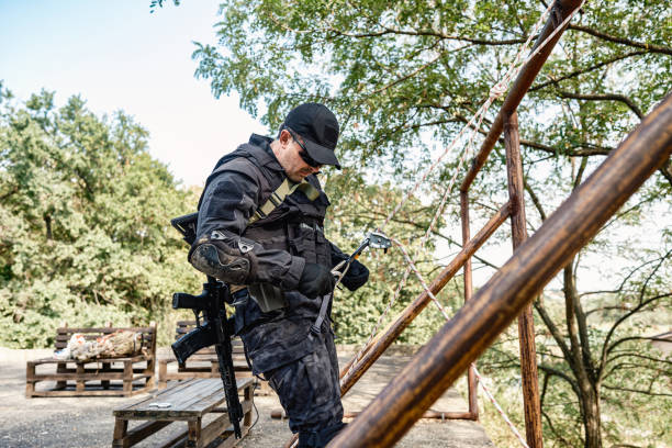istock Special forces operative getting ready for descending rope in military training 2170585444