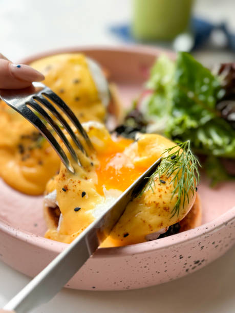 istock Image of enjoying eggs royale / smoked salmon benedict with poached eggs / healthy breakfast 2170588344