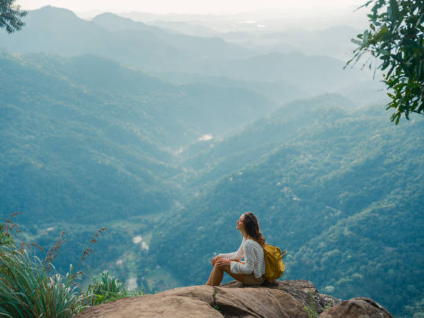 istock Woman on viewpoint in Ella overlooking little Adam's peak 2170591345