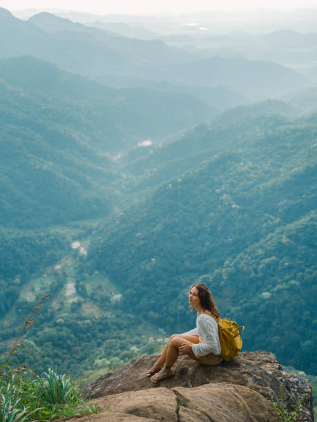 istock Woman on viewpoint in Ella overlooking little Adam's peak 2170591353