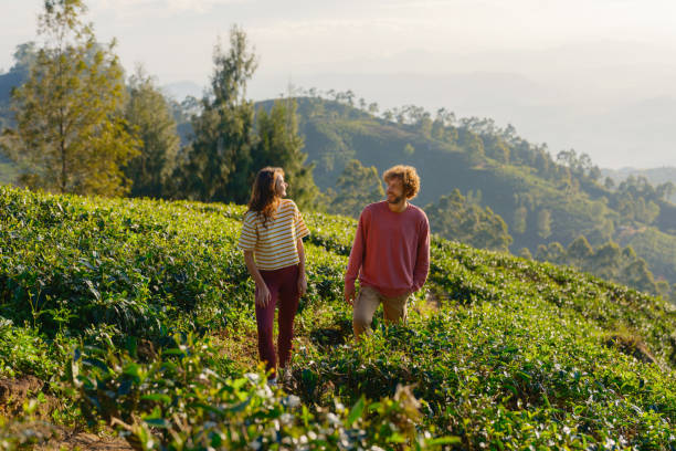 istock Cheerful man and woman on tea plantation 2170593155