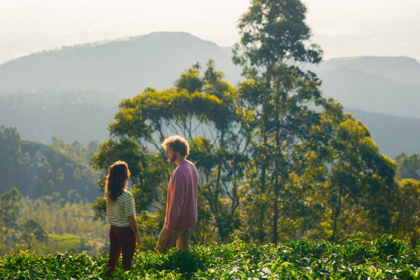 istock Cheerful man and woman on tea plantation 2170593396