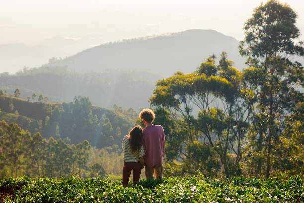 istock Cheerful man and woman on tea plantation 2170593397