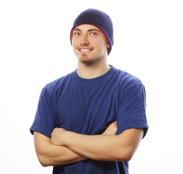 istock man in blue t-shirt and blue hat. 2170597594