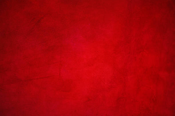 istock Dark red matte background of suede fabric. 2170597665