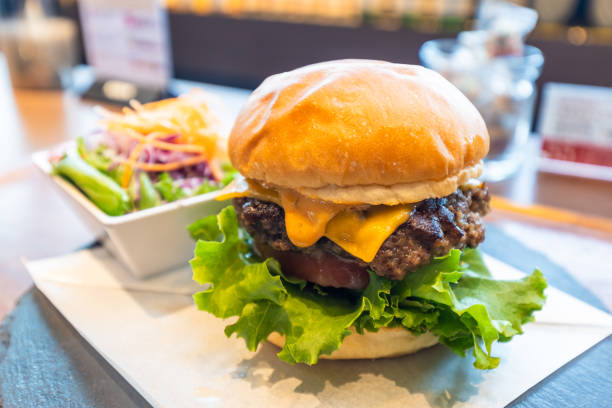 istock A high end gourmet hamburger with side salad at a restaurant 2170598190