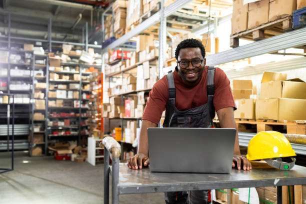 istock African American worker at the warehouse enjoying his work 2170599441