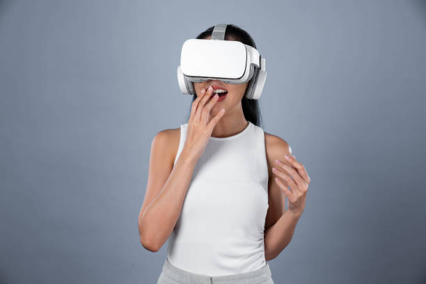 istock Elegant female stand excited seeing virtual scenery in metaverse. Hallucination. 2170600157
