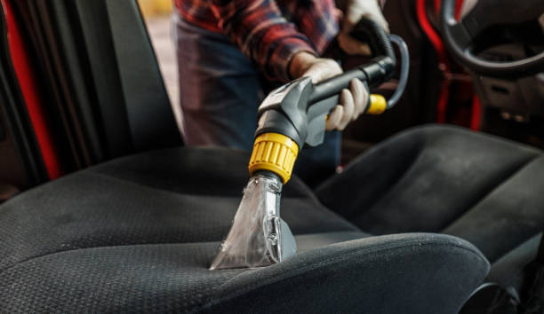 istock Car deep washing. Specialist vacuum-cleaning driver car seat. 2170601866