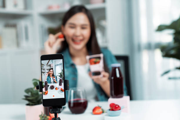 istock Selective focus phone mixed strawberry and cherry juice drinks. Stratagem. 2170610114