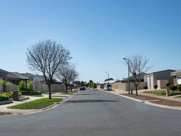 istock Wide street in new housing development 2170611329