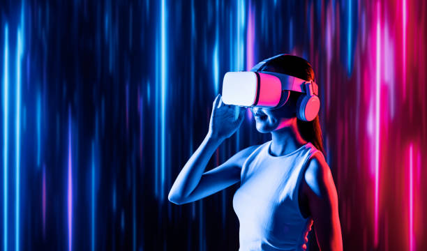 istock Elegant female connecting metaverse looking faraway and smiling. Hallucination. 2170612106