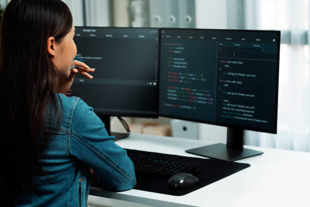 istock Young Asian in IT developer looking online information on pc to pose. Stratagem. 2170616964