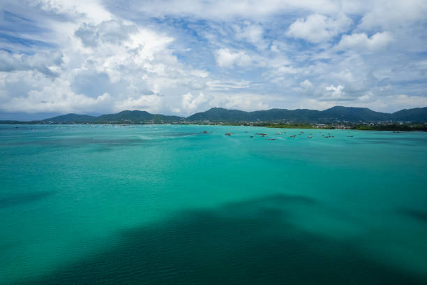 High angle view of Blue sky white clouds over sea with shadow clouds over sea surface nature seascape background