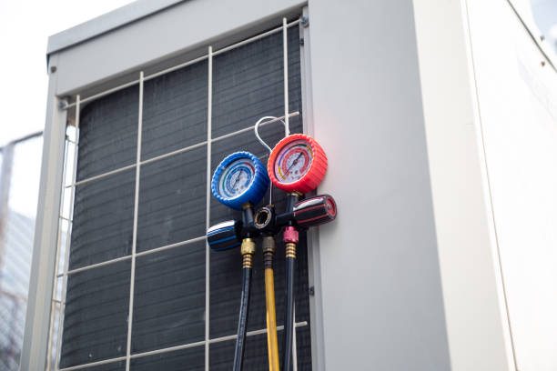 istock Air conditioning service,HVAC Using a gauge to check the refrigerant in the system. Concept of inspection and maintenance services 2170619358