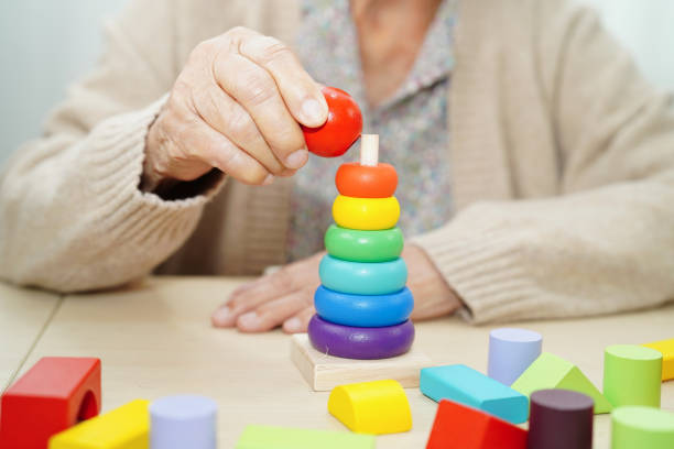 istock Asian elderly woman playing game. 2170619368