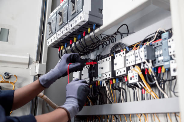 istock Electricity and electrical maintenance service,Electrical tests industrial electrical circuits with a multimeter in the control terminal box. 2170619373