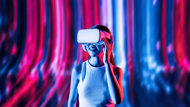 istock Elegant female connecting metaverse looking faraway and smiling. Hallucination. 2170622511
