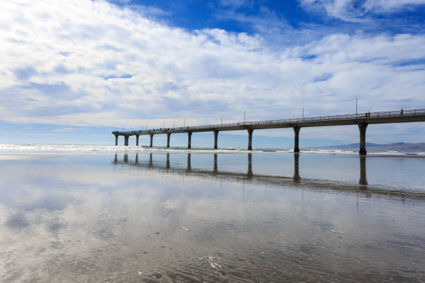 istock Tranquil Pier Over Reflected Sky at New Brighton Beach 2170626191