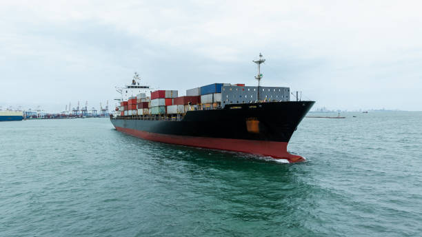 istock logistic cargo container ship sailing in sea to import export goods and distributing products to dealer and consumers across worldwide, by container ship Transport business 2170627208