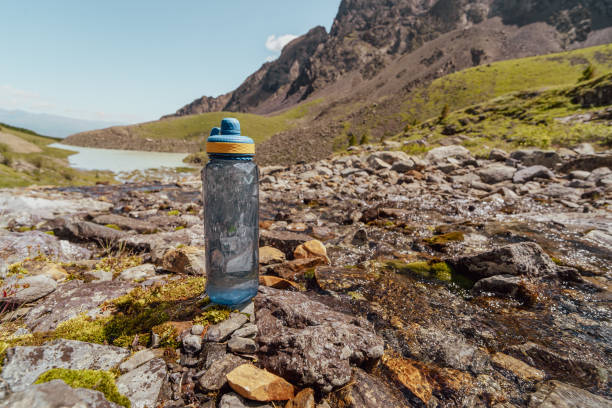 istock bottle of water in the mountains 2170627608