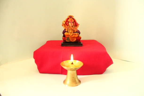 Ganesh chaturthi festival. Indian tradition and culture. A view of small hindu god Ganesha sculpture. Ganesh chaturthi festival in India. Indian tradition and culture. Festivals of India. Brief code - 776165696 rajkot india stock pictures, royalty-free photos & images