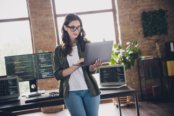 istock Photo of smart lady use modern device gadget netbook create application search bugs fix mistakes indoor room workstation 2170631544
