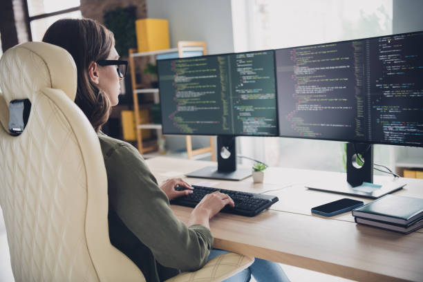 istock Photo of serious cool lady system admin wear eyeglasses checking framework indoors workplace workstation 2170631625