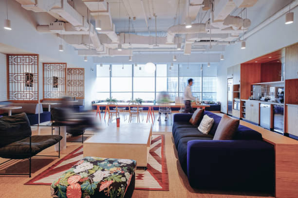 istock A vibrant and modern co-working space with a mix of comfortable lounge seating and work tables 2170634197