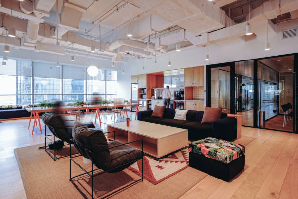 istock A vibrant and modern co-working space with a mix of comfortable lounge seating and work tables 2170634222