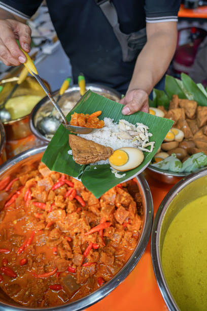 istock A chef serves customers with typical Javanese cuisine 2170636091