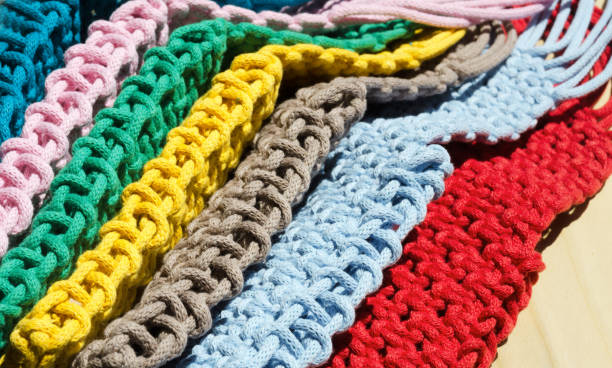 istock Multicolored mobile phone bags on a wooden background. 2170636944