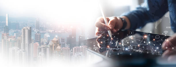 istock Digital marketing, data exchange, global business. Businessman using digital tablet computer double exposure with smart city, online marketing, data transfer, global internet network technology 2170638150