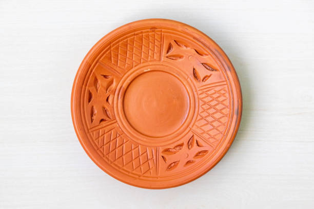 Vintage and antique souvenir plates on display at an antique shop