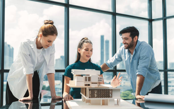 istock Professional architect team working together to design house model. Tracery. 2170645062