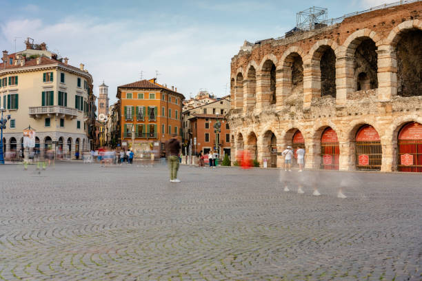 Verona, Italy - June 06, 2024: Bra square with Arena. Sunny summer day, medium cloudy sky.