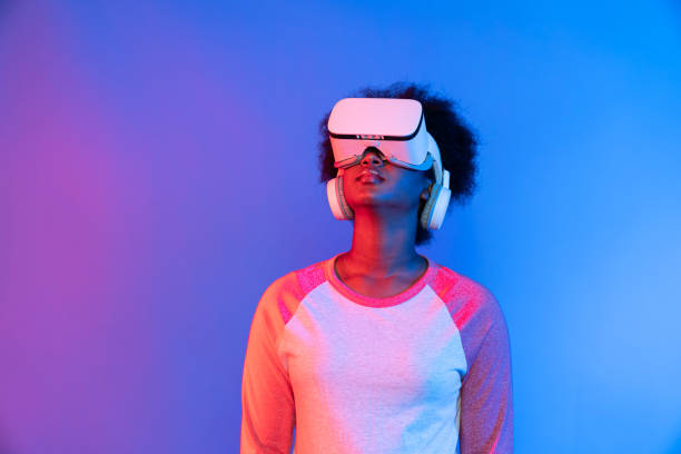 istock Profile thinking beautiful African wearing VR glasses metaverse. Contrivance. 2170648860