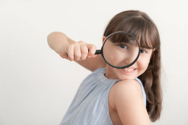 istock Girl with magnifier 2170649392