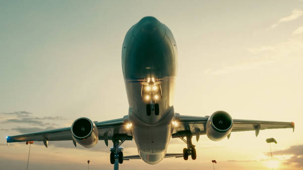 istock 3D illustration Render. Passenger plane is landing during a wonderful sunrise. 2170649956