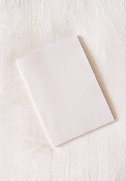 istock White magazine mockup on white hotel bed 2170654071
