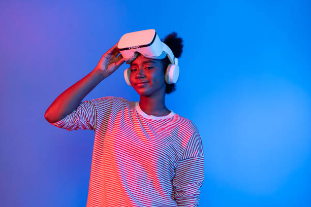 istock Profile young African American with VR headset at neon light. Contrivance. 2170654233