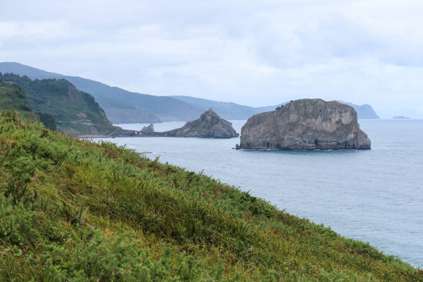 istock Cloudy Day Over Gaztelugatxe from Matxitxako Lighthouse 2170654448