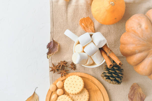 istock Rustic Autumn Still Life with Marshmallows, Cookies, Pumpkins, perfect for fall events and parties 2170659495