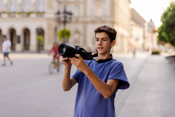 istock Taking snapshots of everything he sees 2170661103