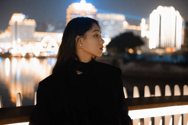 istock Beautiful women shopping at night 2170661701