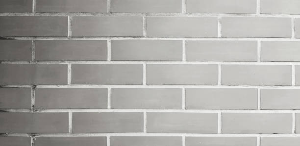 istock Pattern of gray or grey brick wall for background in black and white or monochrome style. Wallpaper, Shape. Line and Textured concept. 2170663711