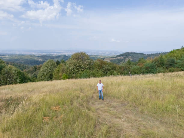 Man enjoy in nature, taking a break from urban activities in city for a weekend
