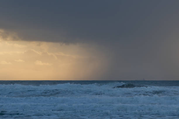 istock White sea waves and cloudy skyscape in the evening 2170665806